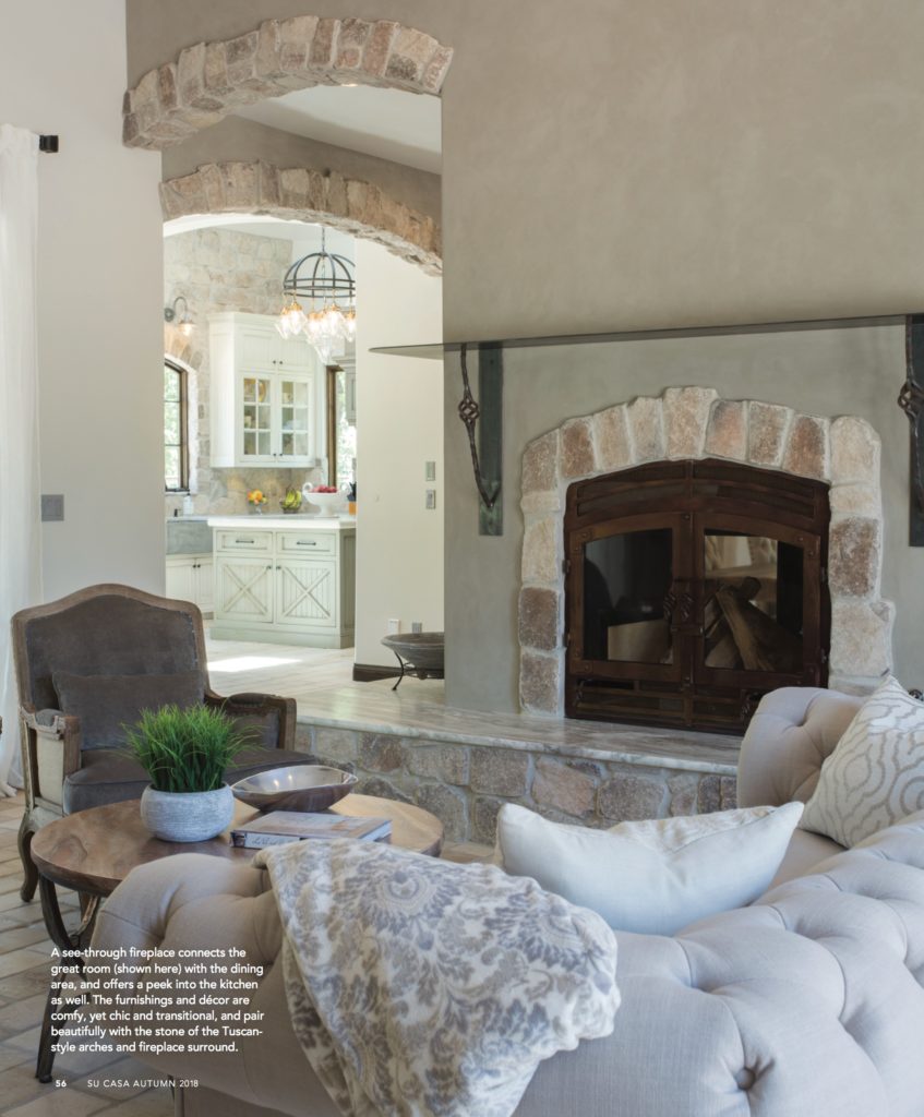 Great Room, Double-Sided Steel Woodburning Fireplace, Custom Steel Mantle and Corbles, Clay Wall, Belgian Stone Accents, Quartzite Banco, French Limestone Floors, Su Casa Magazine Feature, Photo by 3-D Cats Studio